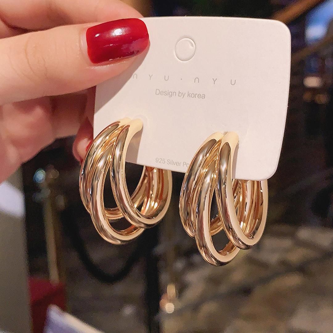 Twirl Glow Golden Earrings