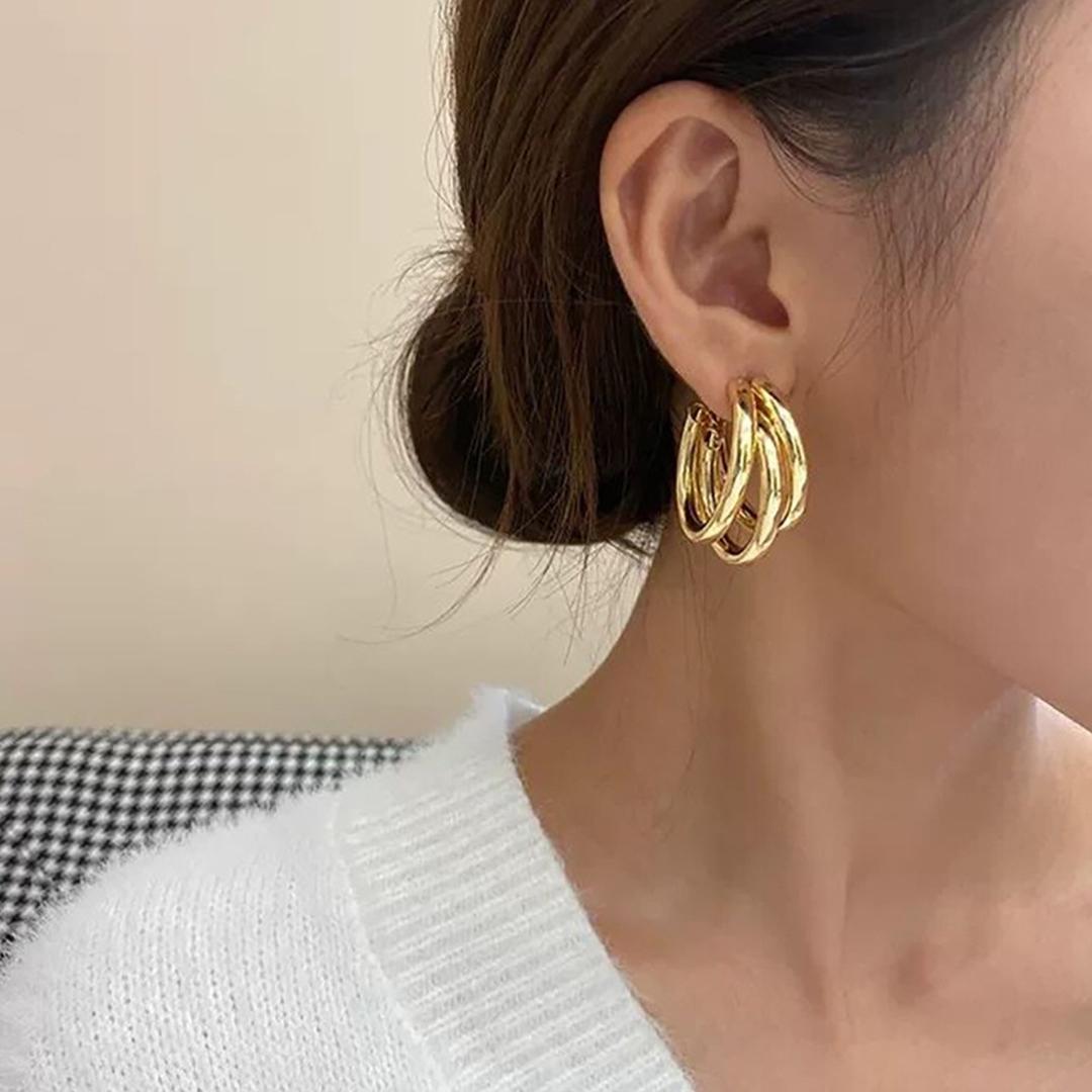 Twirl Glow Golden Earrings